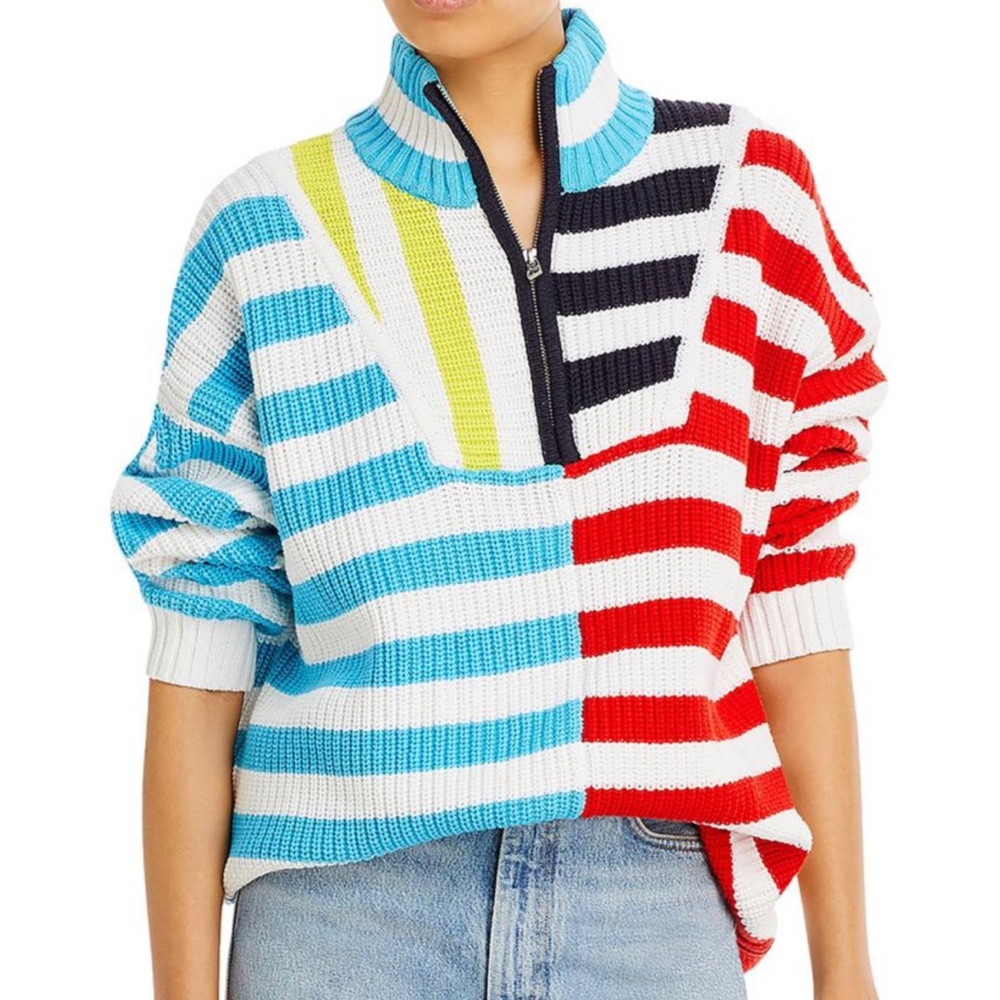 Striped half zip sweater.